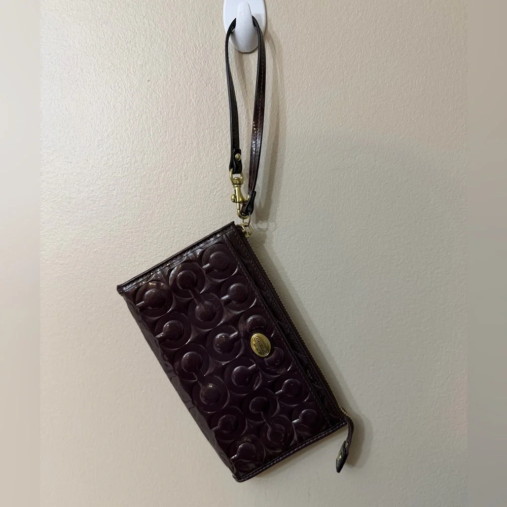 COACH Op Art Rich Purple Leather Wristlet